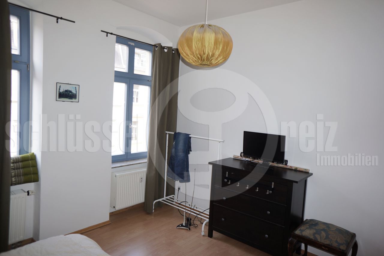 Schlafzimmer mit Ankleideraum