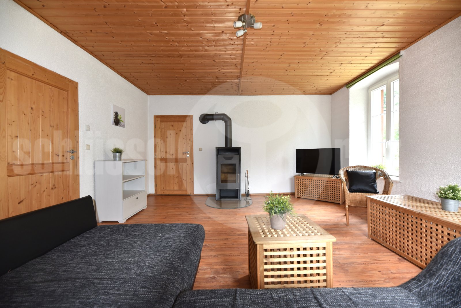 Wohnzimmer mit Kamin - Ferienwohnung 1 Wohnzimmer mit Kamin - Ferienwohnung 1